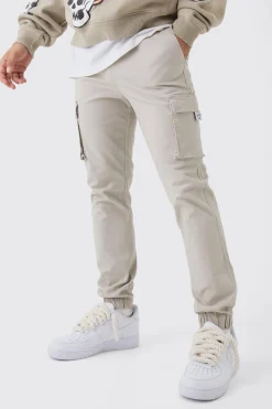 Slim Fit Elasticated Waist Woven Tab Cuffed Cargo Trousers | BoohooMAN UK