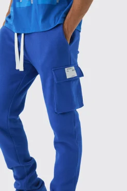 Slim Fit Extreme Stacked Woven Tab Cargo Jogger | BoohooMAN UK