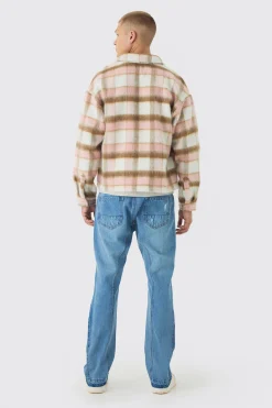 Slim Fit Flared Ripped Knee Jeans With Let Down Hem | BoohooMAN UK
