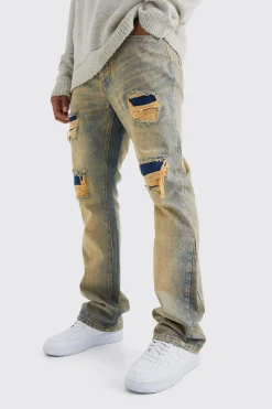 Slim Flare Rigid Multi Rip & Repair Jean | BoohooMAN UK