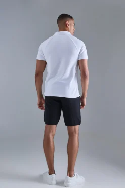Slim Raglan Zip Neck Interlock Golf Polo | BoohooMAN UK