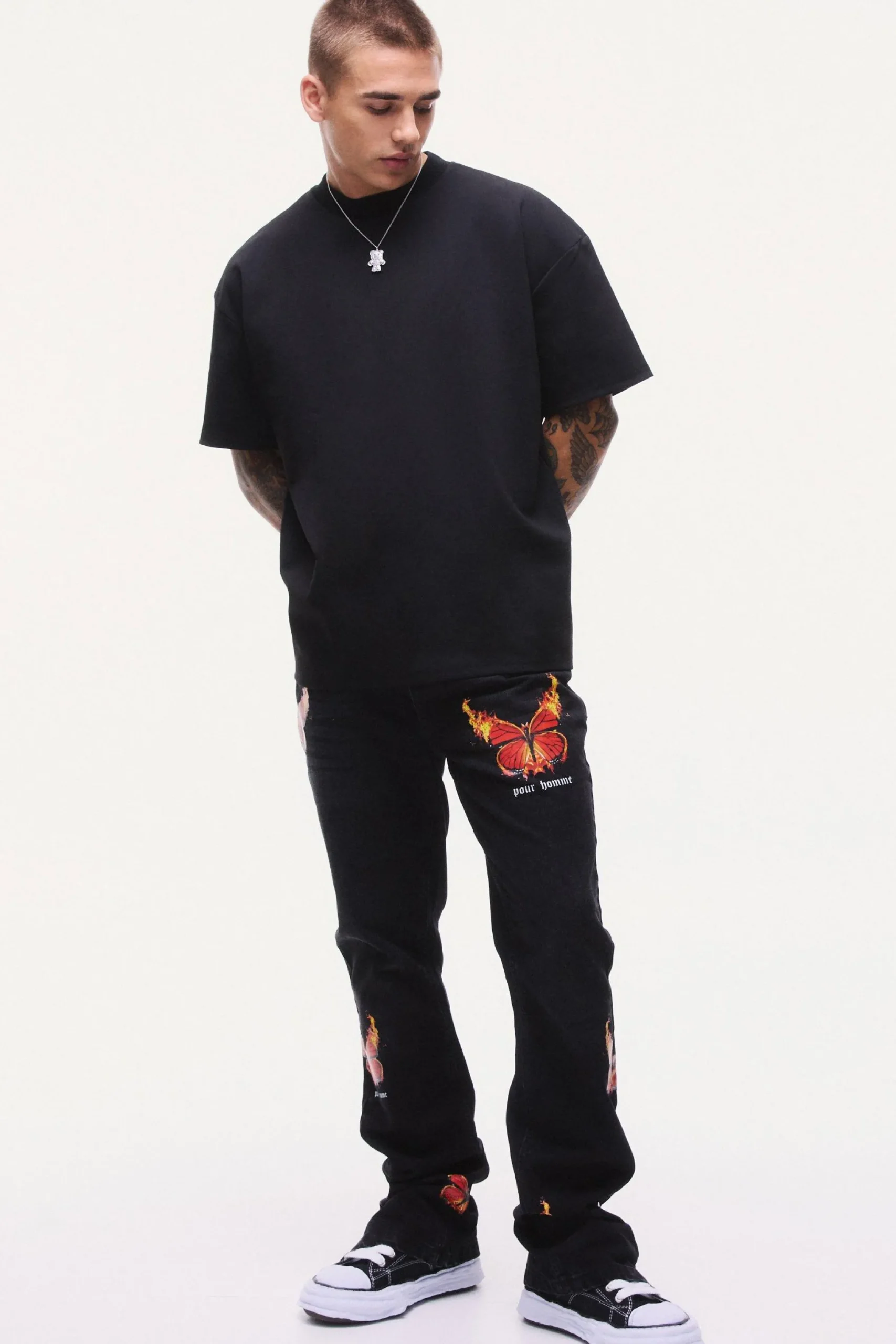 Slim Rigid Flare Popper Hem Graphic Butterfly Jeans | BoohooMAN UK