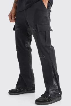 Slim Stacked Flare Camo Gusset Rip And Repair Trouser | BoohooMAN UK