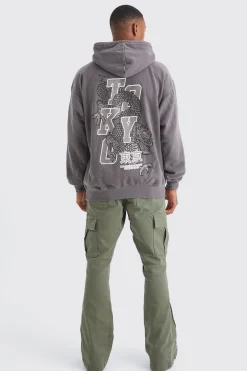 Slim Stacked Flare Camo Gusset Rip And Repair Trouser | BoohooMAN UK