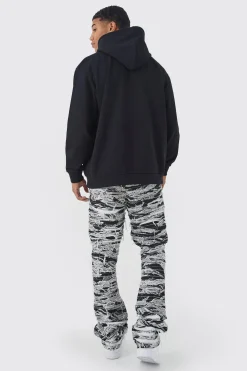 Slim Stacked Flare Heavily Distressed Camo Trouser | BoohooMAN UK