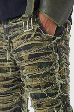 Slim Stacked Flare Heavily Distressed Camo Trouser | BoohooMAN UK