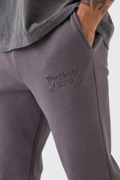 Slim Stacked Worldwide Emboss Joggers | BoohooMAN UK