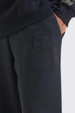Split Hem Jogger With Distressed Badge | BoohooMAN UK