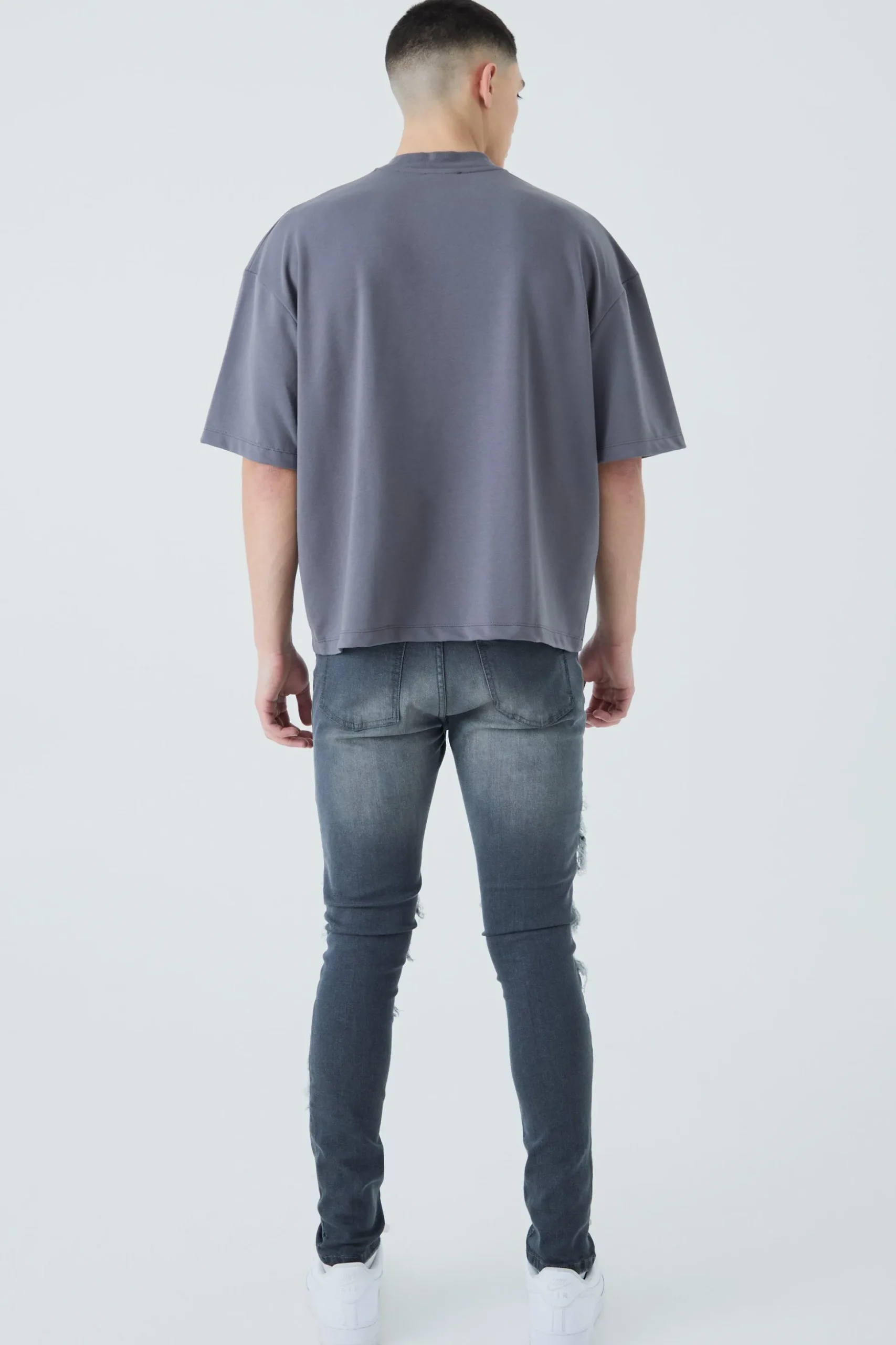 Super Skinny Biker Rip & Repair Paint Splatter Jeans | BoohooMAN UK