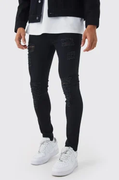 Super Skinny Jeans With All Over Rips | BoohooMAN UK