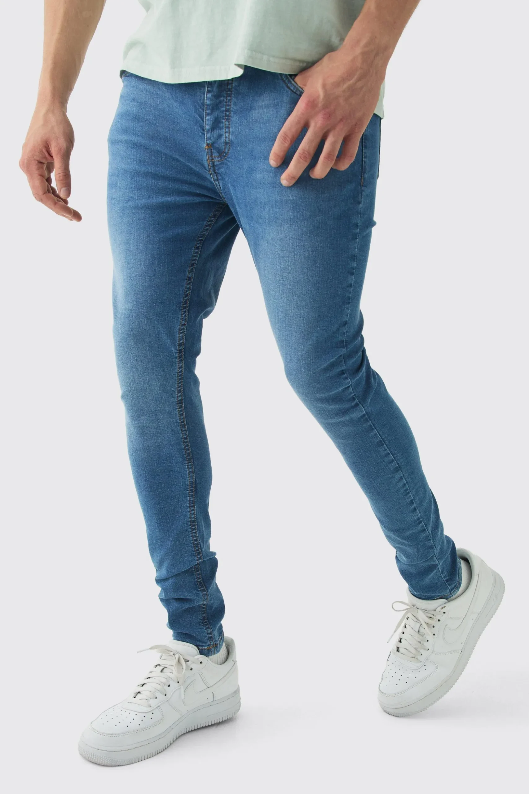 Super Skinny Stretch Jean In Mid Blue | BoohooMAN UK