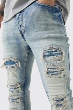 Super Skinny Stretch Pale Blue Biker Rip & Repair Jeans | BoohooMAN UK