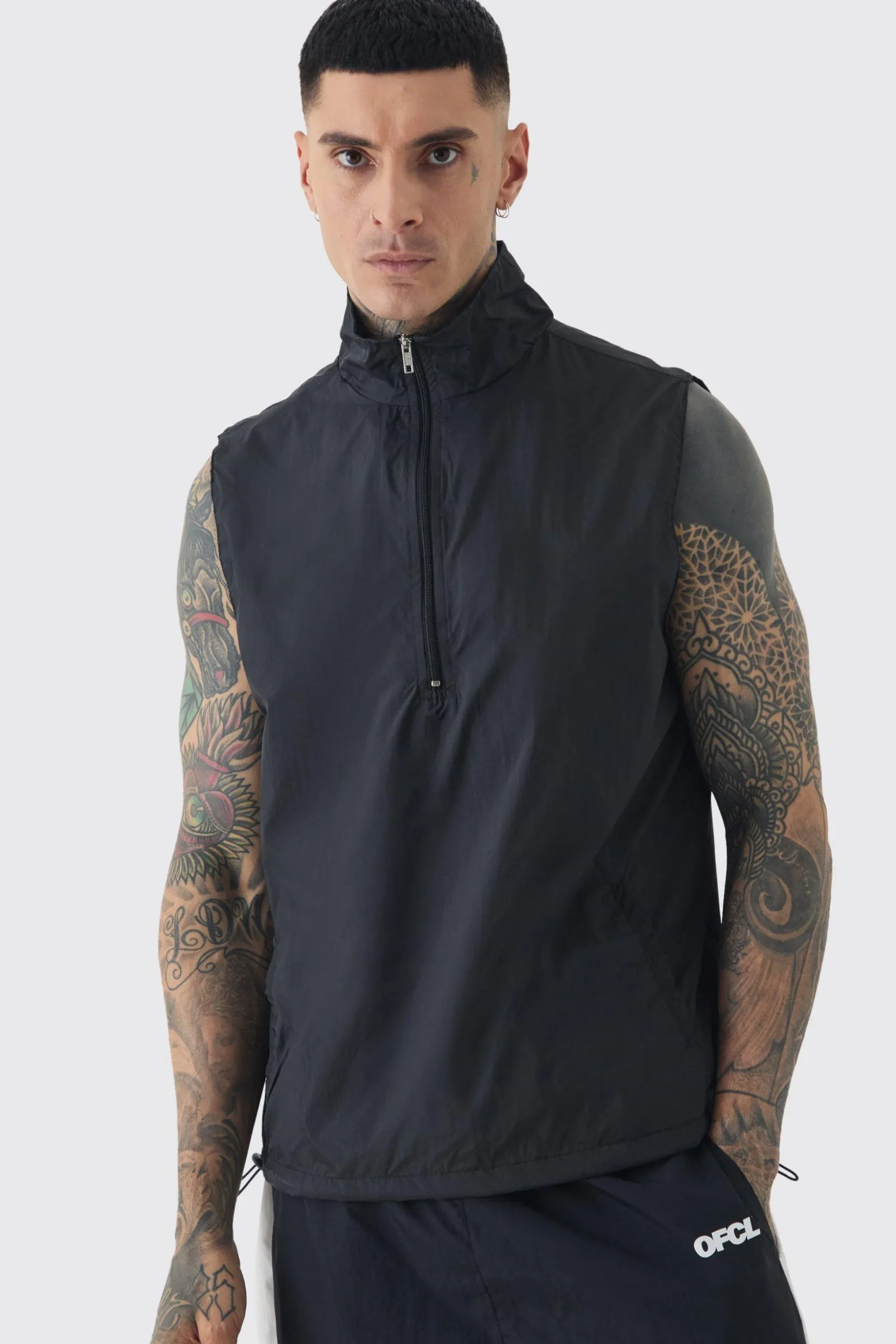 Tall 1/4 Zip Lightweight Adjustable Hem Gilet | BoohooMAN UK