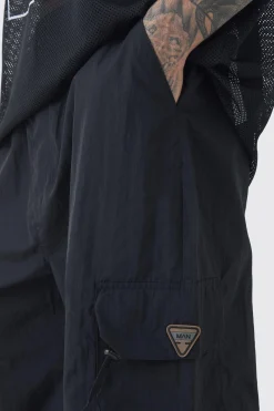 Tall Crinkle Nylon Cargo Parachute Trousers In Black | BoohooMAN UK