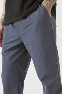 Tall Elasticated Lightweight Technical Stretch Slim Fit Trousers | BoohooMAN UK