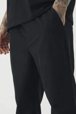 Tall Elasticated Waist Lightweight Technical Stretch Slim Trouser | BoohooMAN UK