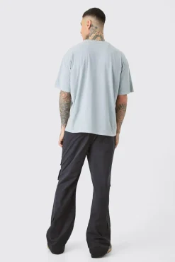 Tall Fixed Waist Relaxed Peached Flare Cargo Trouser | BoohooMAN UK