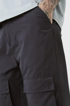 Tall Fixed Waist Relaxed Peached Flare Cargo Trouser | BoohooMAN UK