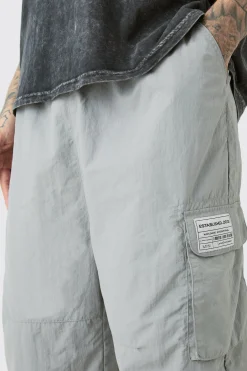 Tall Pleat Knee Branded Parachute Pants | BoohooMAN UK