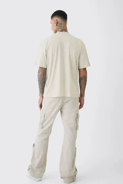 Tall Relaxed Flare Overdye Popper Hem Cargo Trouser In Stone | BoohooMAN UK