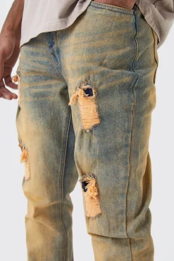 Tall Slim Flare Stretch Multi Rip & Repair Jean | BoohooMAN UK