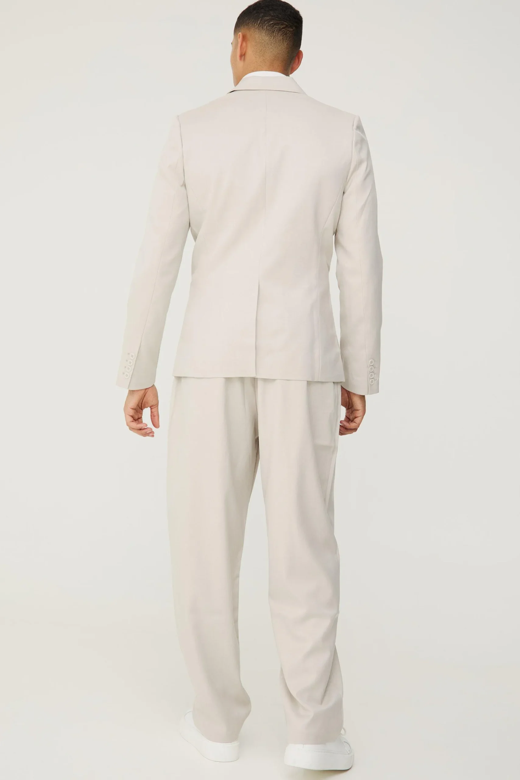 Textured Relaxed Fit Trousers | BoohooMAN UK