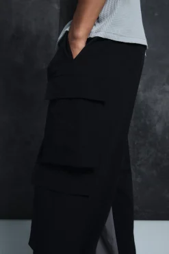 Trippie Redd Elasticated Waist Relaxed Technical Stretch Cargo Trousers | BoohooMAN UK