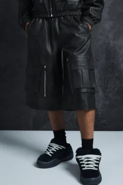 Trippie Redd Relaxed Longline Washed Pu Cargo Jorts In Black | BoohooMAN UK