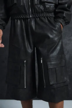 Trippie Redd Relaxed Longline Washed Pu Cargo Jorts In Black | BoohooMAN UK