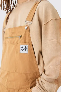 Washed Twill Branded Zip Carpenter Relaxed Fit Dungarees | BoohooMAN UK